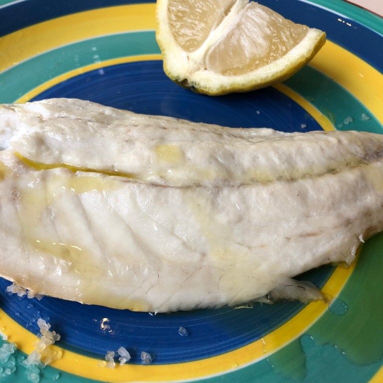 דג מוכן עם שמן זית